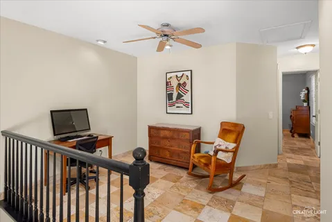 a view of a workspace with furniture