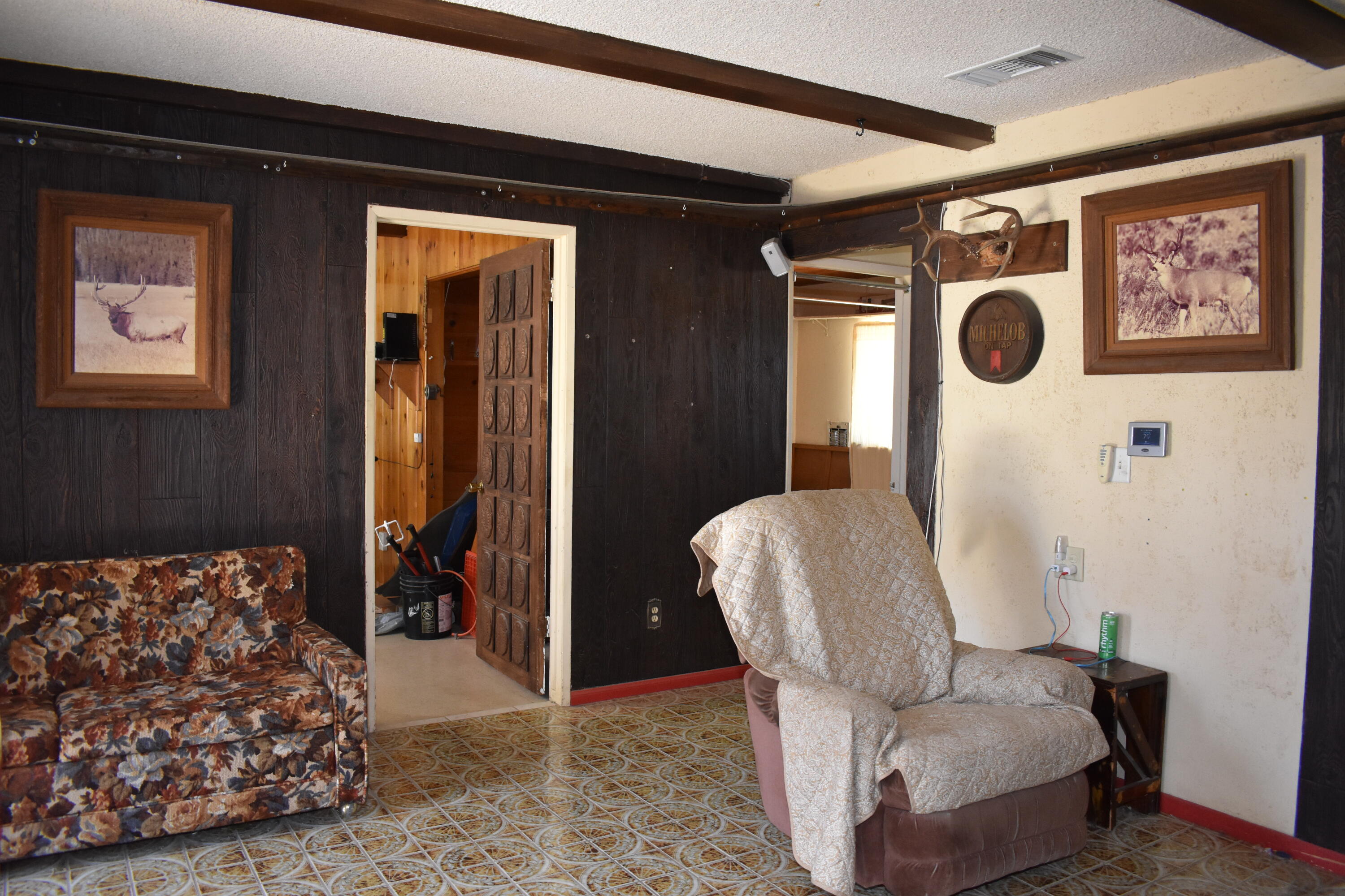 6293 Backus Road Mojave, CA 93501 - Photo 9 of 35 a living room with furniture and a painting