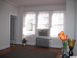 508 North Tryon Street, Unit 221 Charlotte, NC 28202 - Photo 3 of 10 a room with furniture and a window