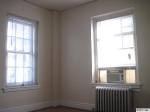 508 North Tryon Street, Unit 221 Charlotte, NC 28202 - Photo 4 of 10 an empty room with a window