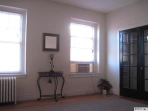 508 North Tryon Street, Unit 221 Charlotte, NC 28202 - Photo 6 of 10 a room with windows and a table