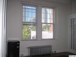 508 North Tryon Street, Unit 221 Charlotte, NC 28202 - Photo 8 of 10 a view of an empty room with a window