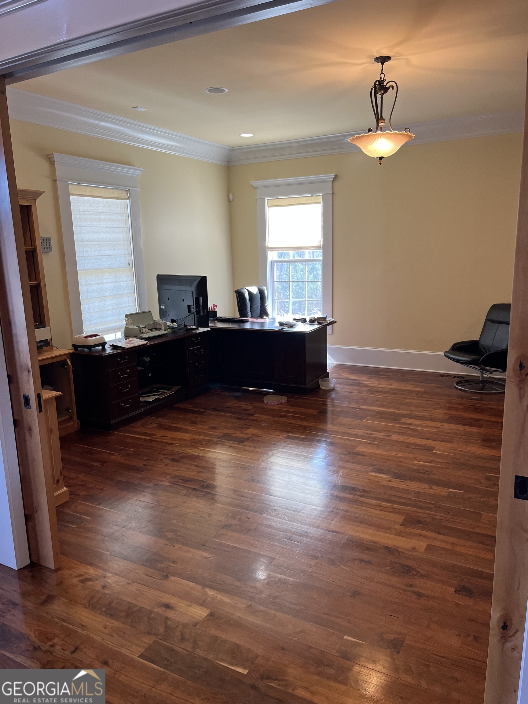 87 Ridgeview Lane Ringgold, GA 30736 - Photo 12 of 32 a living room with wooden floors and a dresser