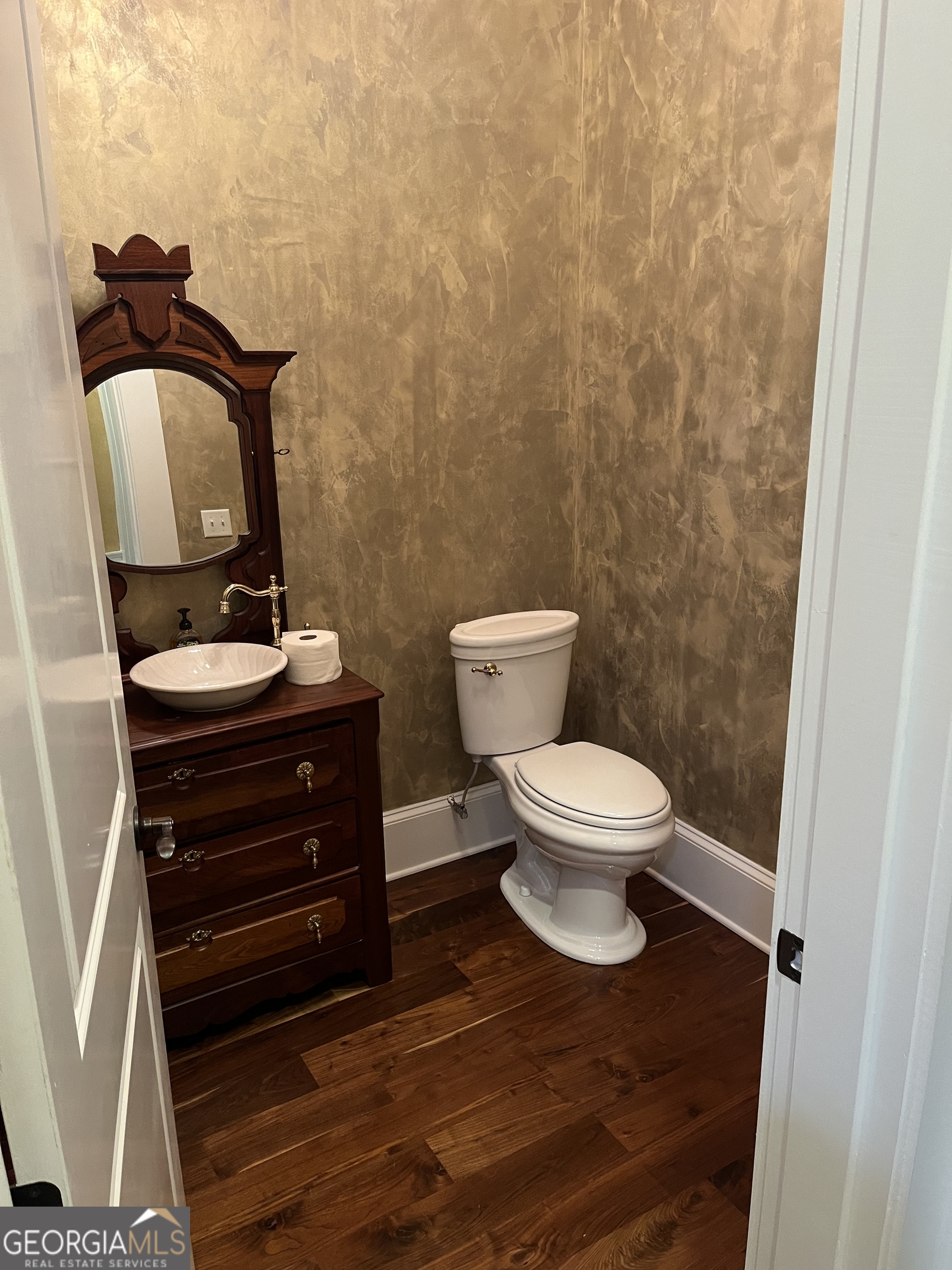 87 Ridgeview Lane Ringgold, GA 30736 - Photo 13 of 32 a bathroom with a toilet and a mirror