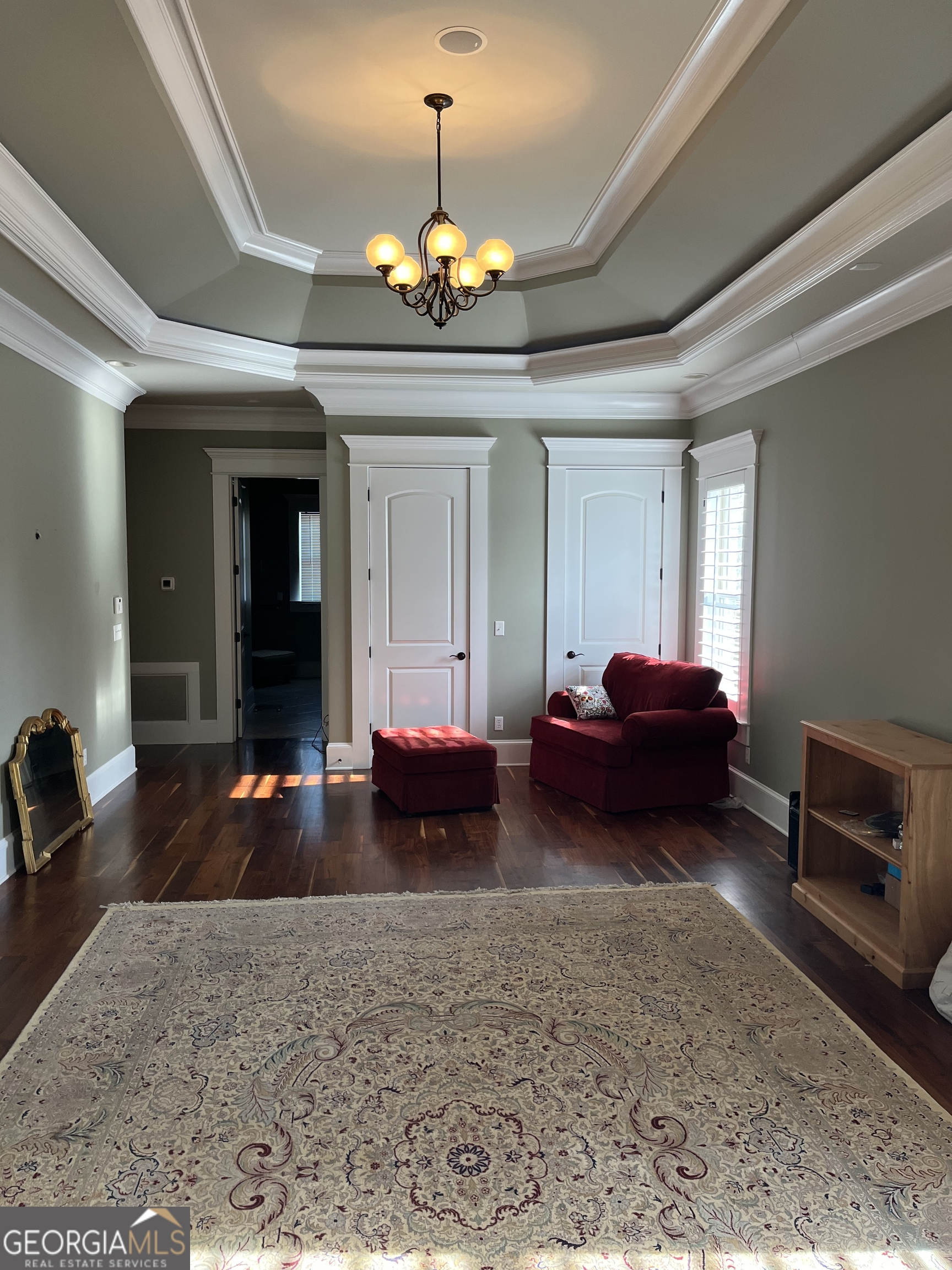 87 Ridgeview Lane Ringgold, GA 30736 - Photo 19 of 32 a living room with furniture and a chandelier