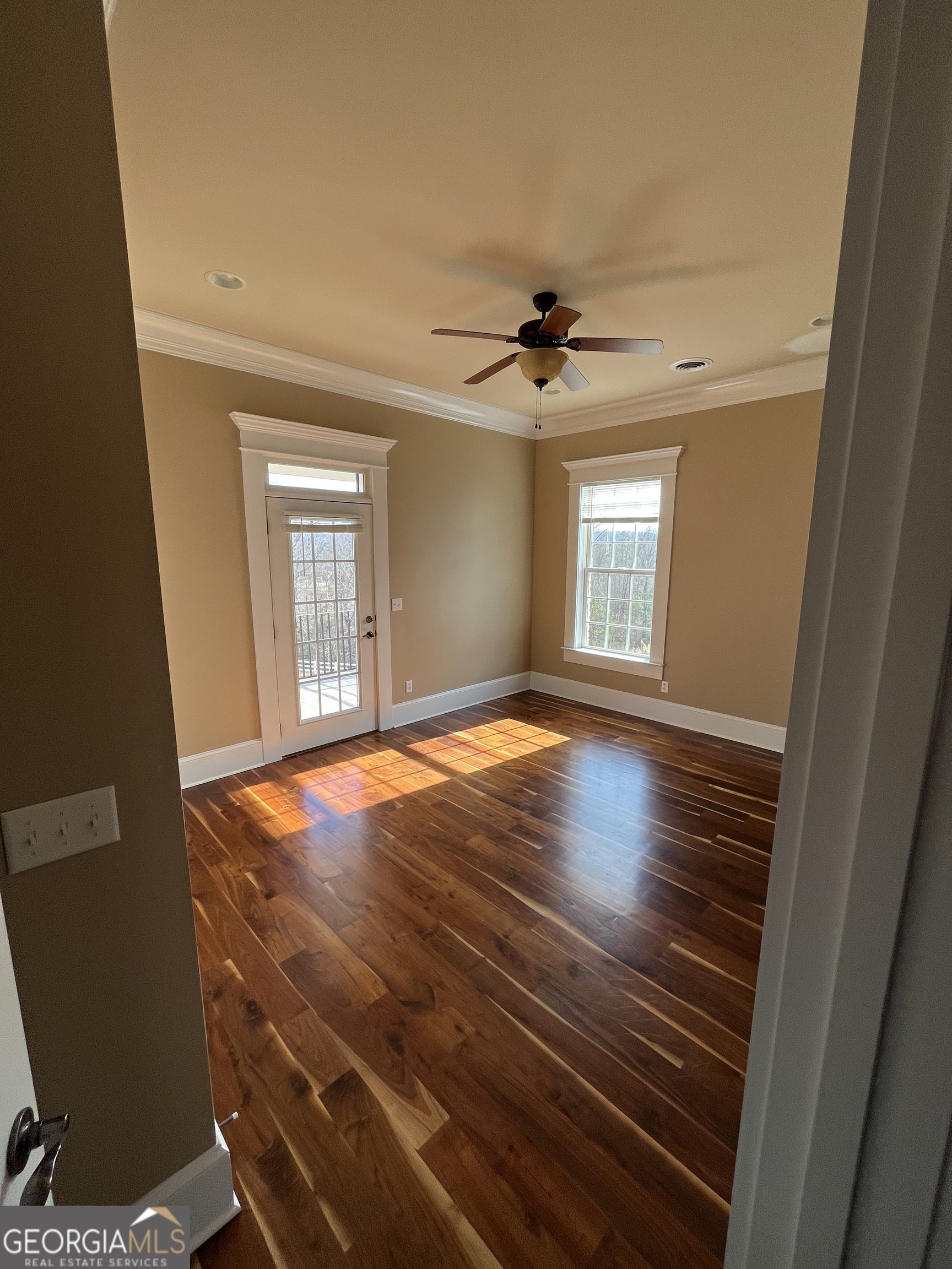 87 Ridgeview Lane Ringgold, GA 30736 - Photo 27 of 32 a view of an empty room with window and wooden floor