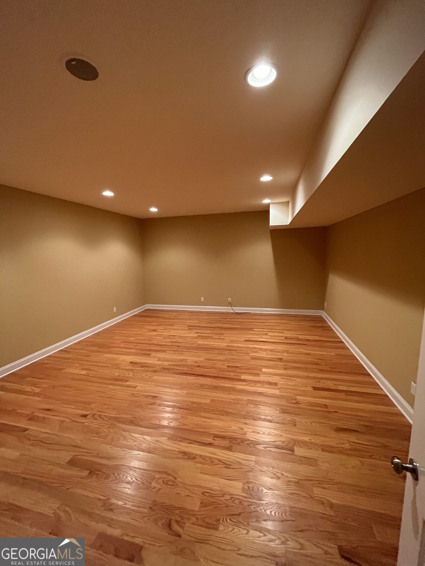 87 Ridgeview Lane Ringgold, GA 30736 - Photo 32 of 32 a view of empty room with wooden floor
