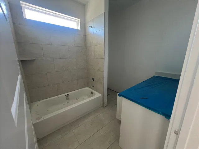 a bathroom with a bathtub