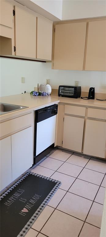 2218 Abbey Road Southwest Winter Haven, FL 33880 - Photo 3 of 31 a kitchen with a sink cabinets and appliances