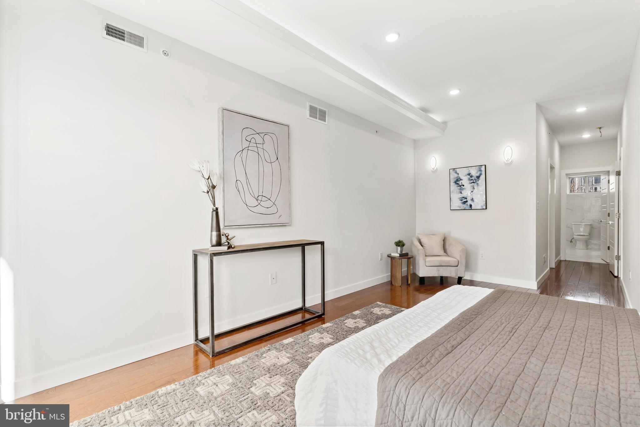 827 Leland Street Philadelphia, PA 19130 - Photo 22 of 40 a bedroom with a bed and a window