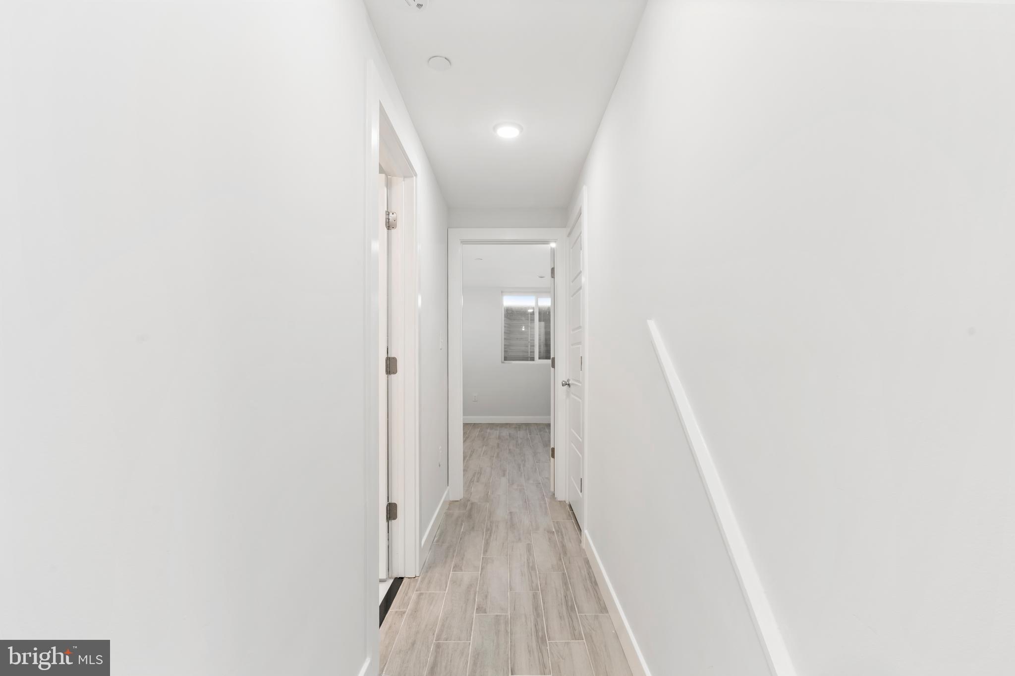827 Leland Street Philadelphia, PA 19130 - Photo 32 of 40 a view of a room with wooden floor