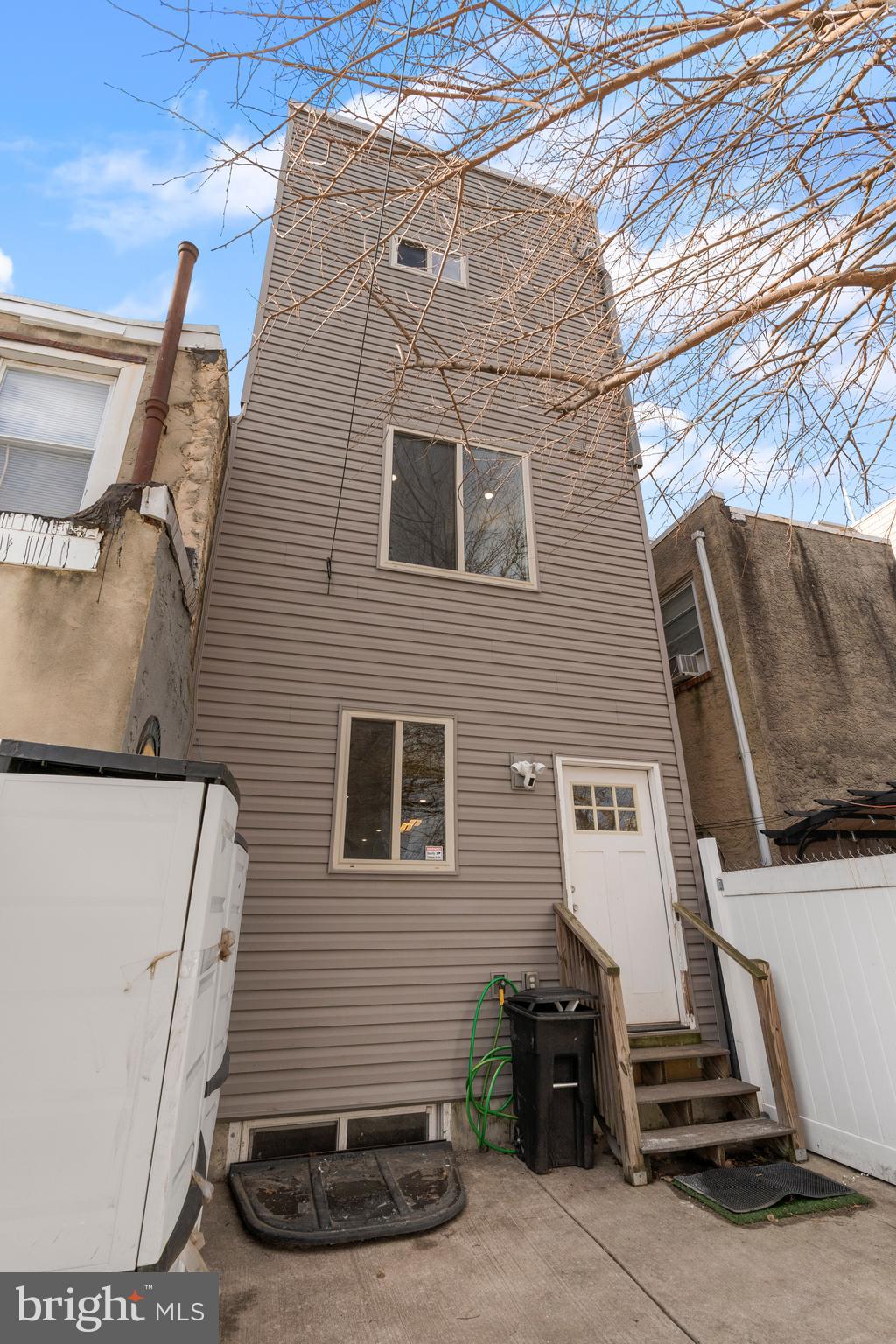 827 Leland Street Philadelphia, PA 19130 - Photo 38 of 40 a front view of a house with stairs