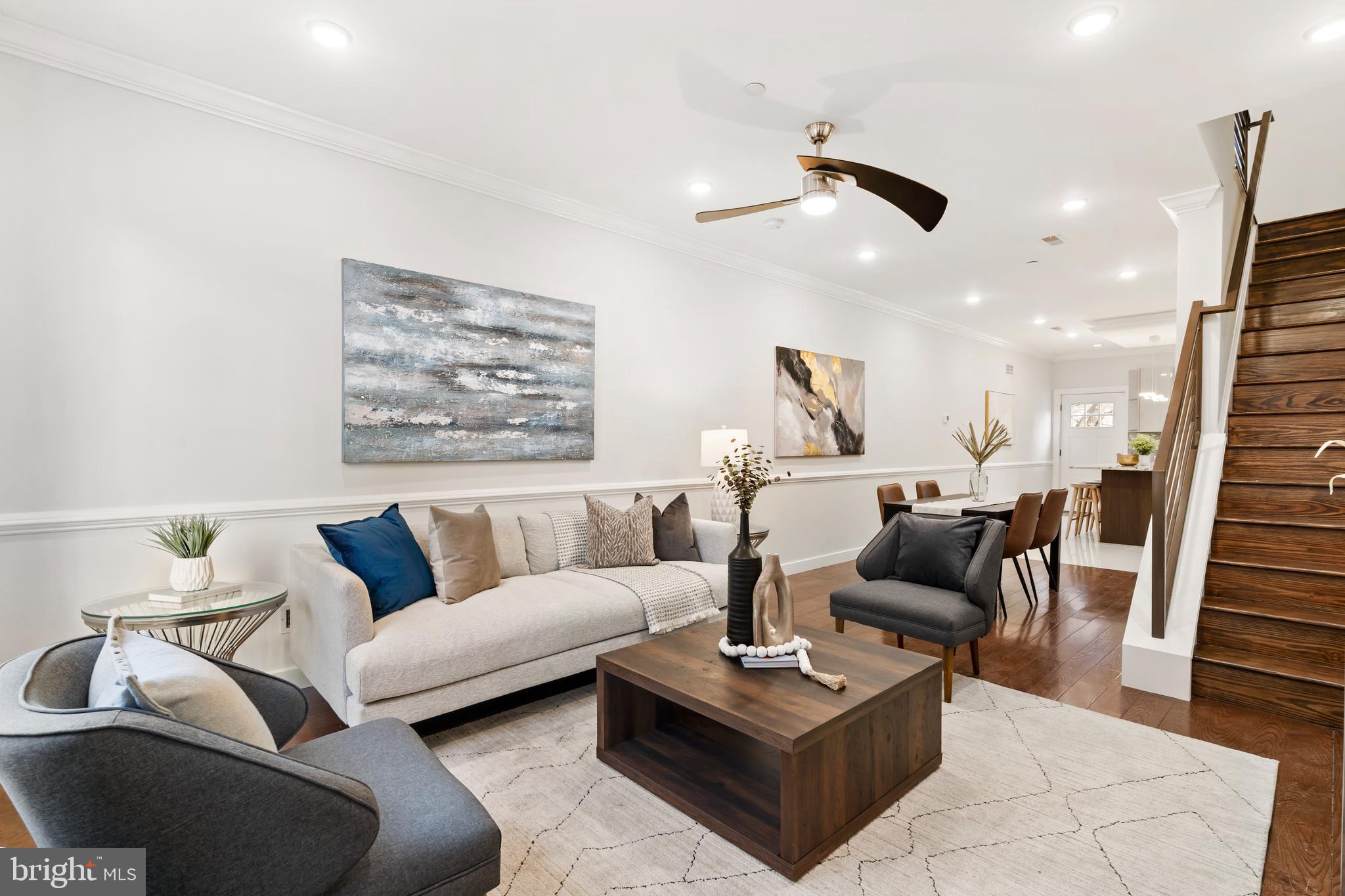 827 Leland Street Philadelphia, PA 19130 - Photo 6 of 40 a living room with furniture and wooden floor