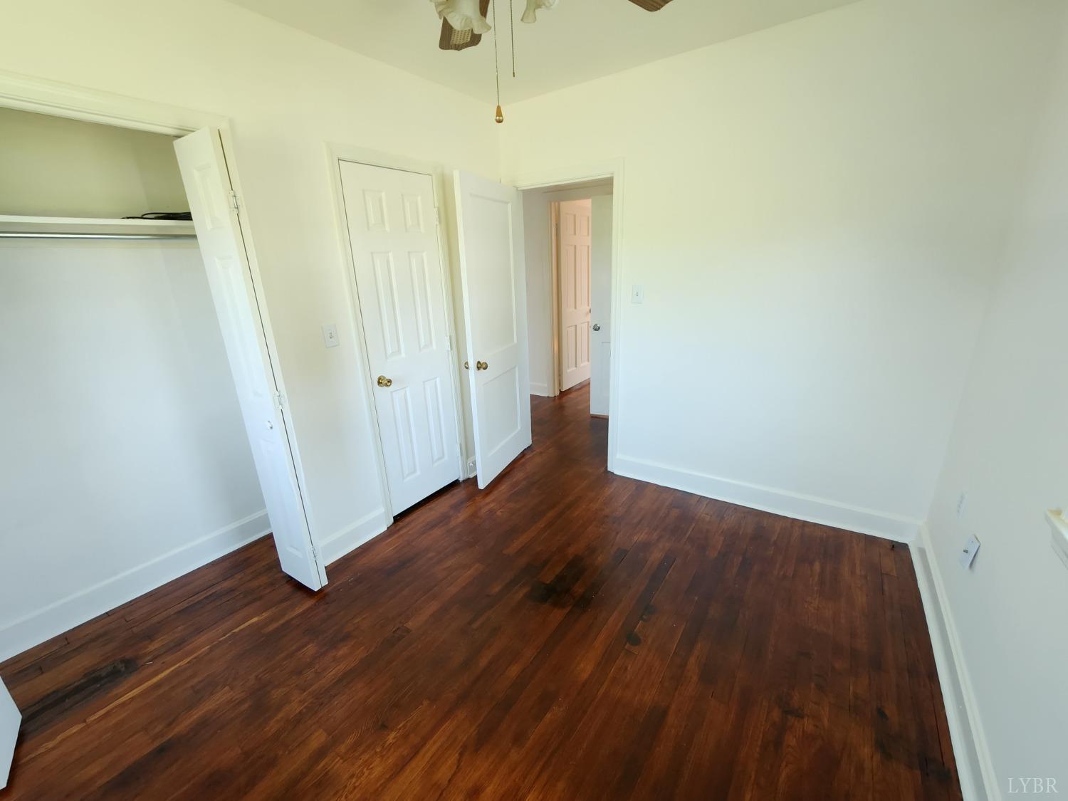 175 Trinity Road Concord, VA 24538 - Photo 11 of 15 a view of a room with wooden floor and window
