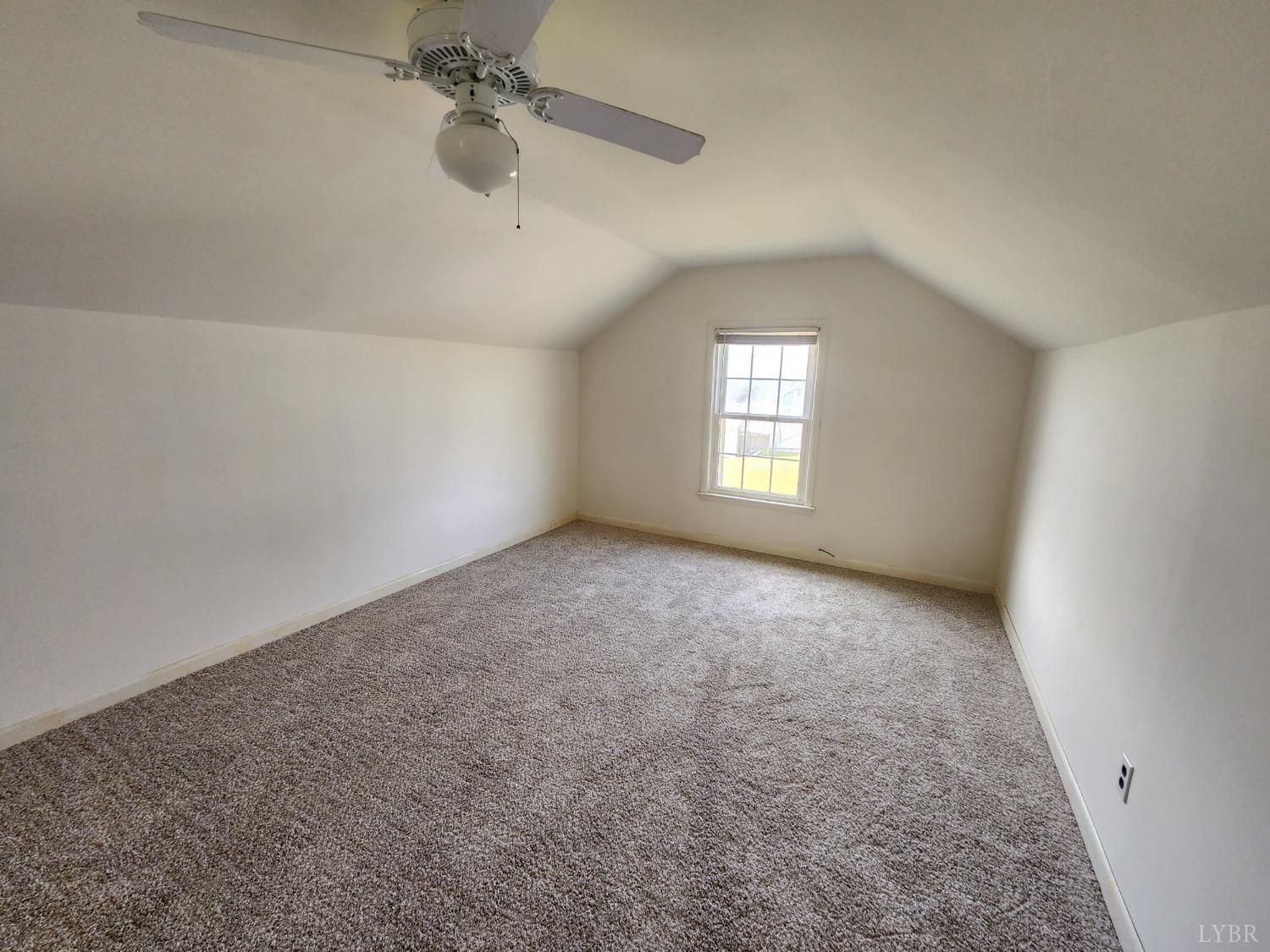 175 Trinity Road Concord, VA 24538 - Photo 13 of 15 an empty room with windows and fan