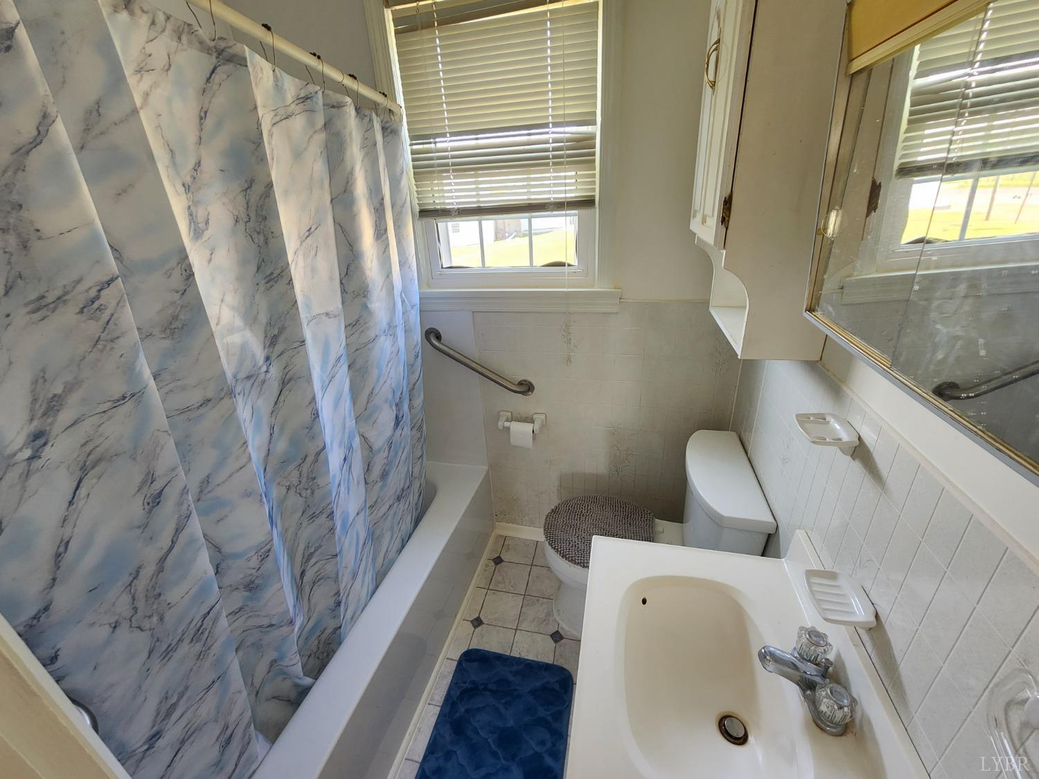 175 Trinity Road Concord, VA 24538 - Photo 9 of 15 a bathroom with a sink and a tub