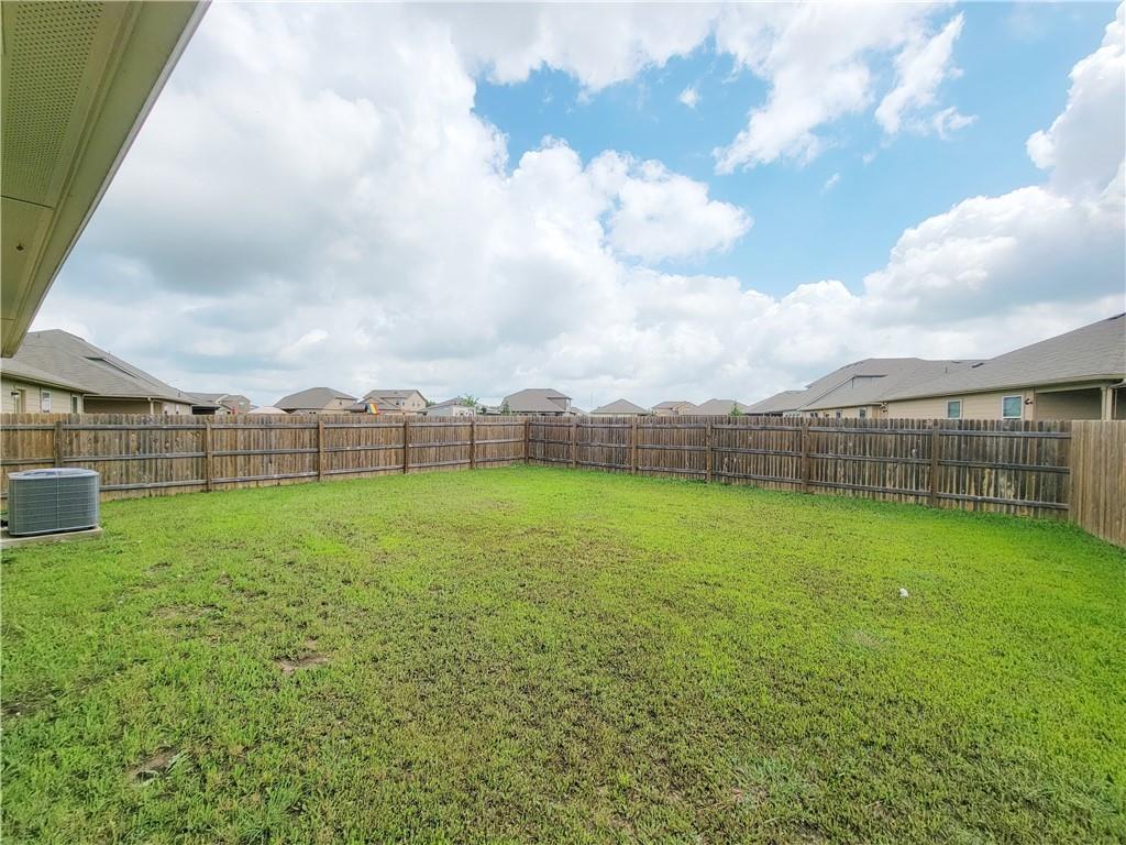 11924 Riparian Road Manor, TX 78653 - Photo 13 of 14 a view of a backyard