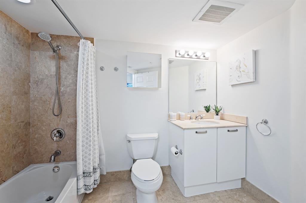 2011 North Ocean Boulevard, Unit 1605 Fort Lauderdale, FL 33305 - Photo 20 of 52 a bathroom with a sink toilet and shower