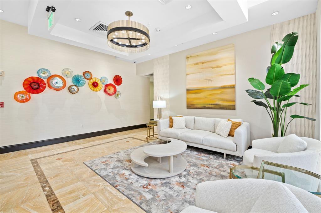 2011 North Ocean Boulevard, Unit 1605 Fort Lauderdale, FL 33305 - Photo 28 of 52 a living room with furniture and window