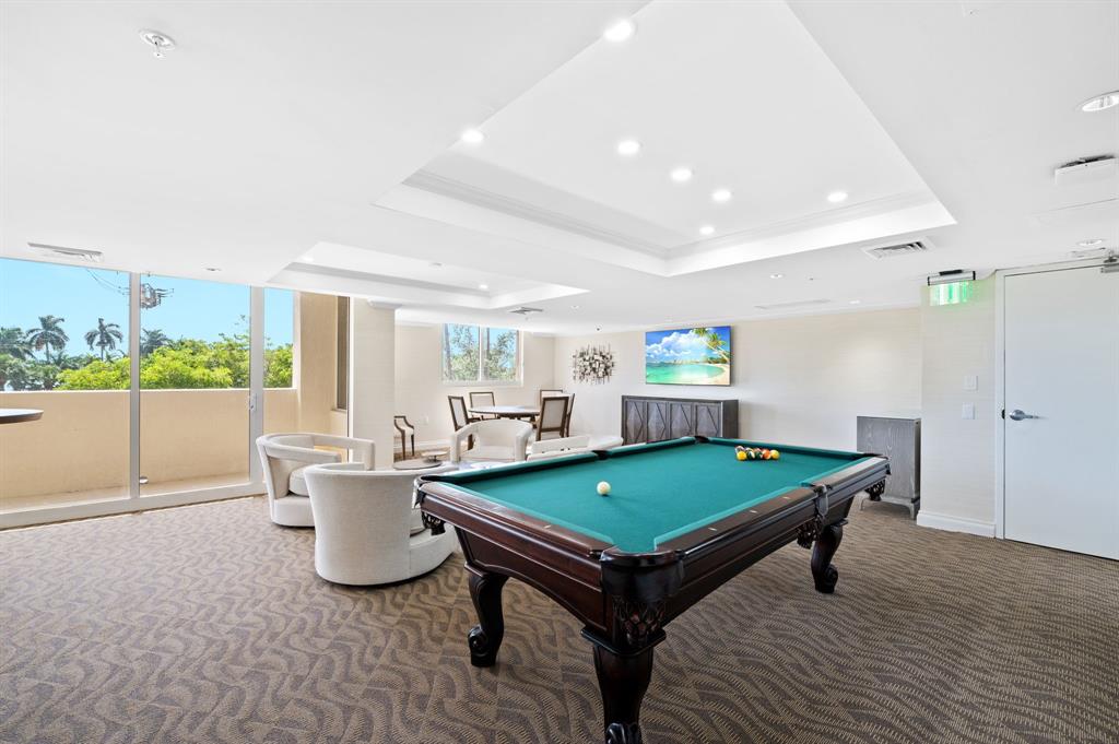 2011 North Ocean Boulevard, Unit 1605 Fort Lauderdale, FL 33305 - Photo 30 of 52 a room with pool table and windows