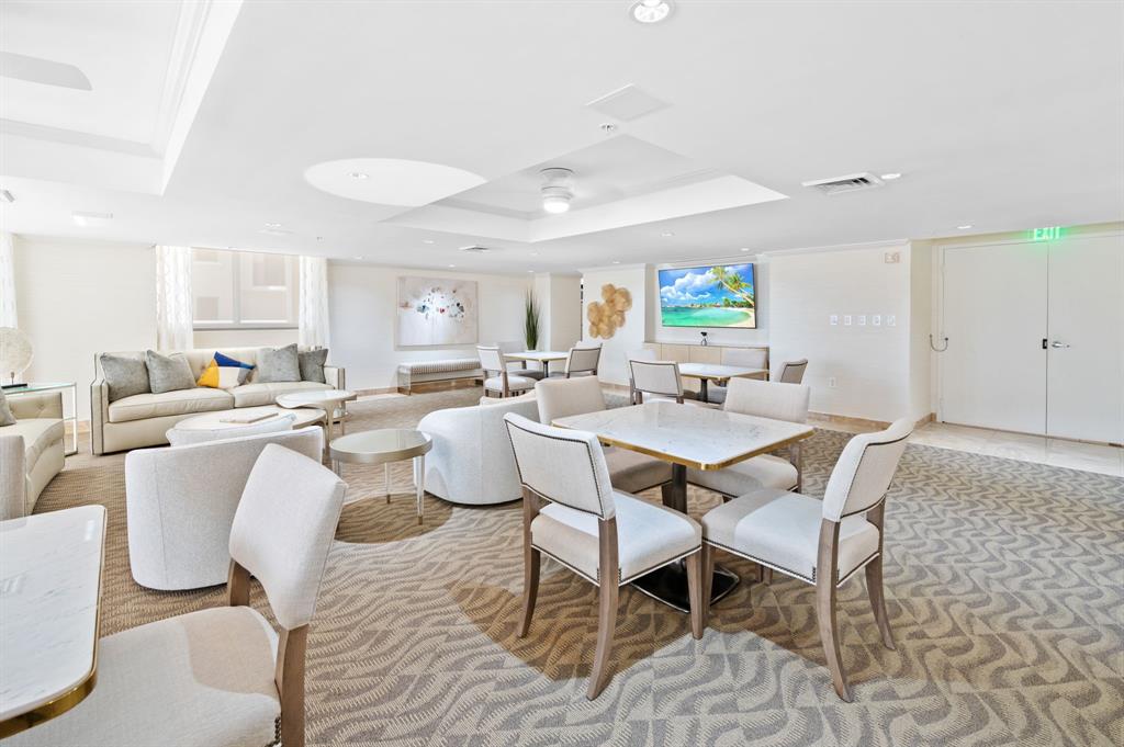 2011 North Ocean Boulevard, Unit 1605 Fort Lauderdale, FL 33305 - Photo 33 of 52 a view of a dining room with furniture
