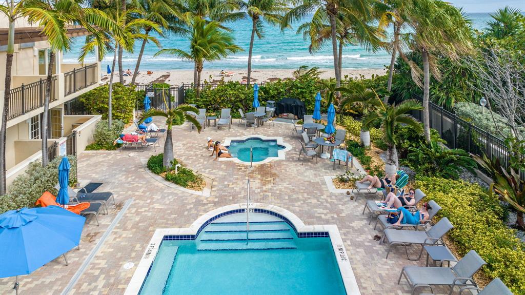 2011 North Ocean Boulevard, Unit 1605 Fort Lauderdale, FL 33305 - Photo 48 of 52 swimming pool view with a seating space