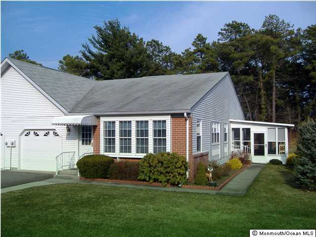 4B Sunset Road, Unit B Whiting, NJ 08759 - Photo 1 of 3 a view of a house with a yard