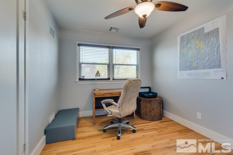 1695 Lander Street Reno, NV 89509 - Photo 21 of 38 a view of a workspace with furniture and a window