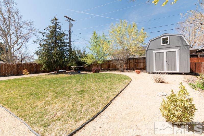 1695 Lander Street Reno, NV 89509 - Photo 27 of 38 a swimming pool with trees in the background