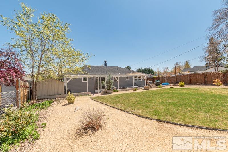 1695 Lander Street Reno, NV 89509 - Photo 28 of 38 a view of a house with a yard