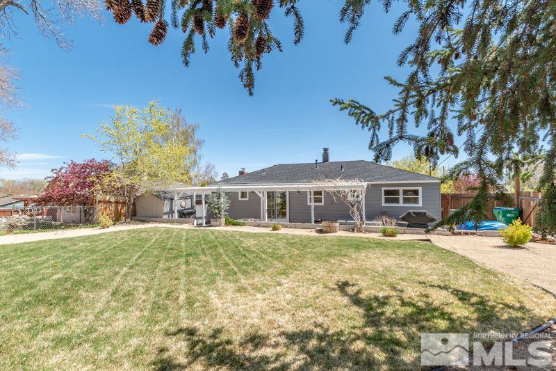 1695 Lander Street Reno, NV 89509 - Photo 29 of 38 a front view of a house with a garden