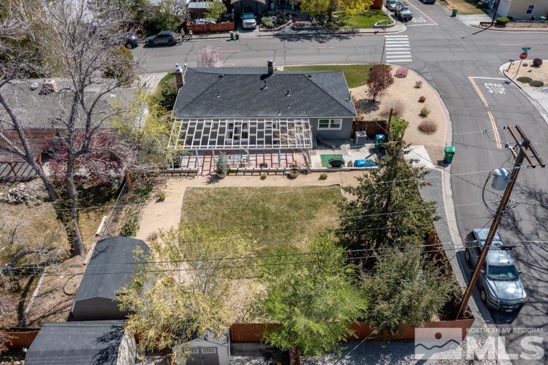 1695 Lander Street Reno, NV 89509 - Photo 33 of 38 a aerial view of a house with large trees and plants