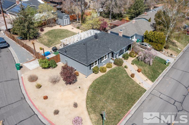 1695 Lander Street Reno, NV 89509 - Photo 8 of 38 an aerial view of a house with a yard and plants
