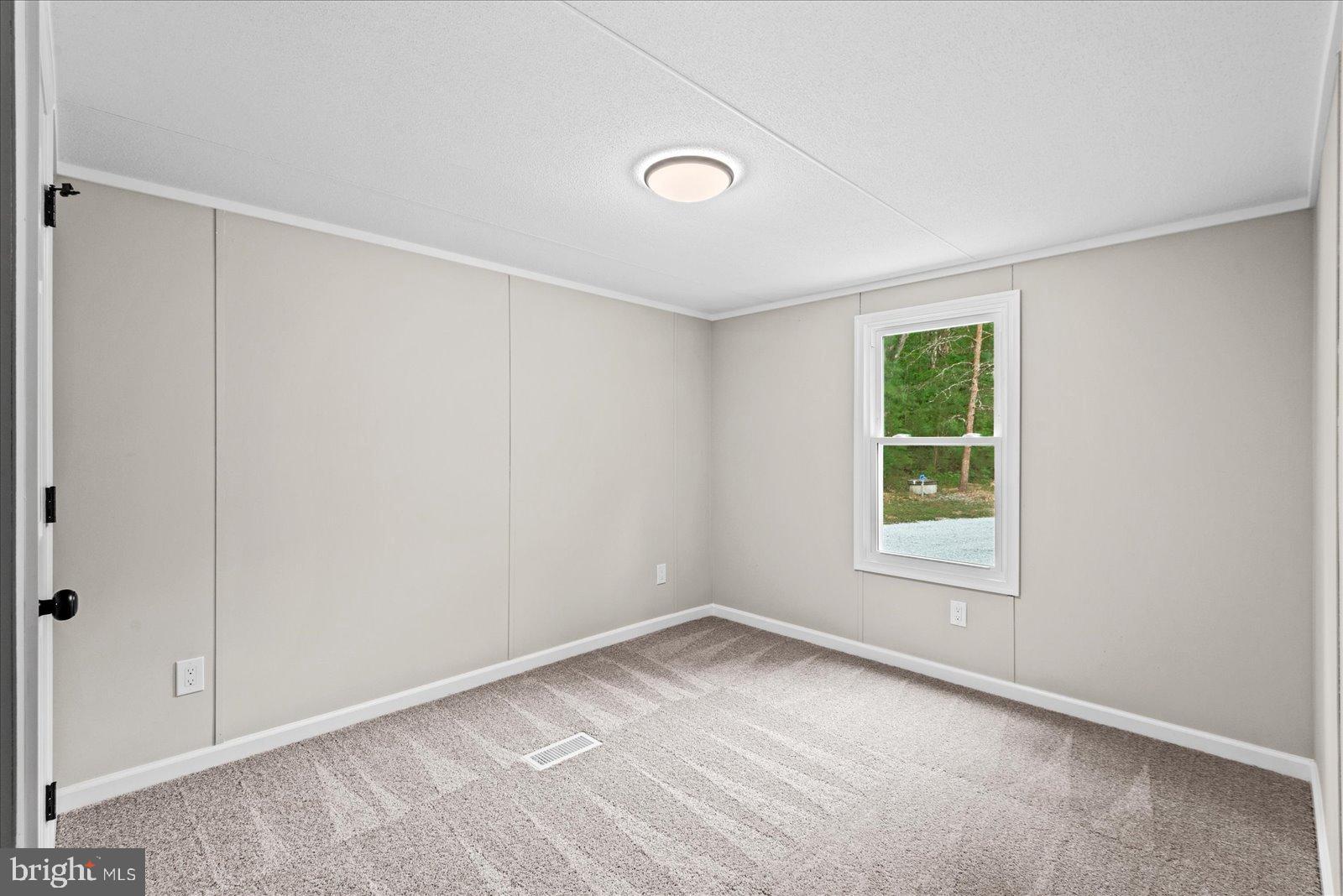 20105 Sparta Road Milford, VA 22514 - Photo 19 of 48 an empty room with a window