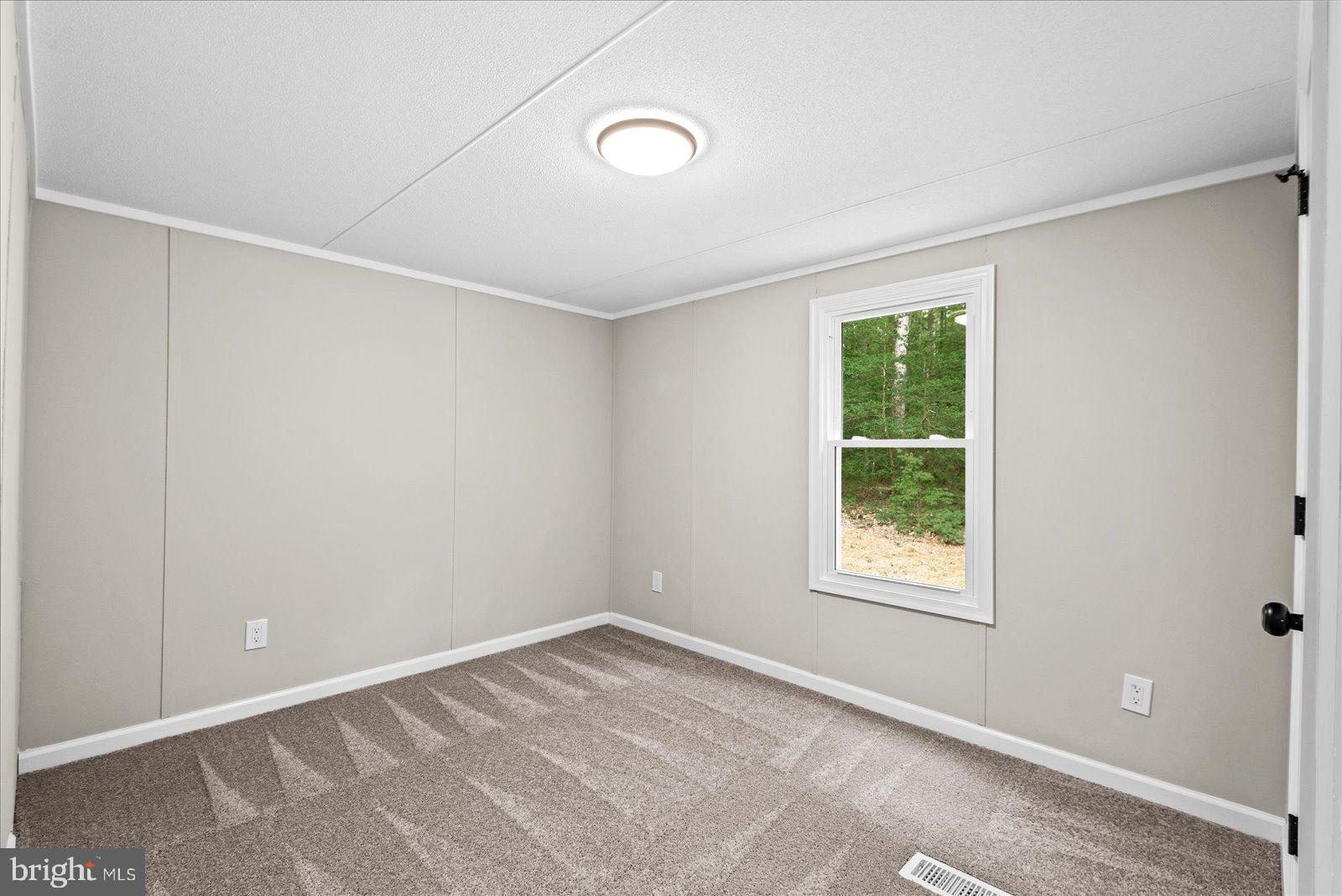 20105 Sparta Road Milford, VA 22514 - Photo 21 of 48 an empty room with a window