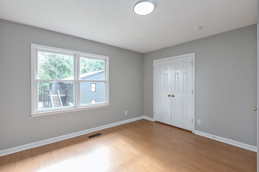 3660 Maryland Circle, Unit B Columbus, GA 31907 - Photo 6 of 21 a view of an empty room with a window
