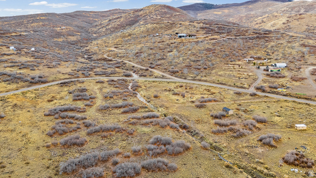 349 West Mountain View Road, Unit 349 Fairview, UT 84629 - Photo 8 of 26 Expansive mountain landscape featuring varied terrain and multiple structures