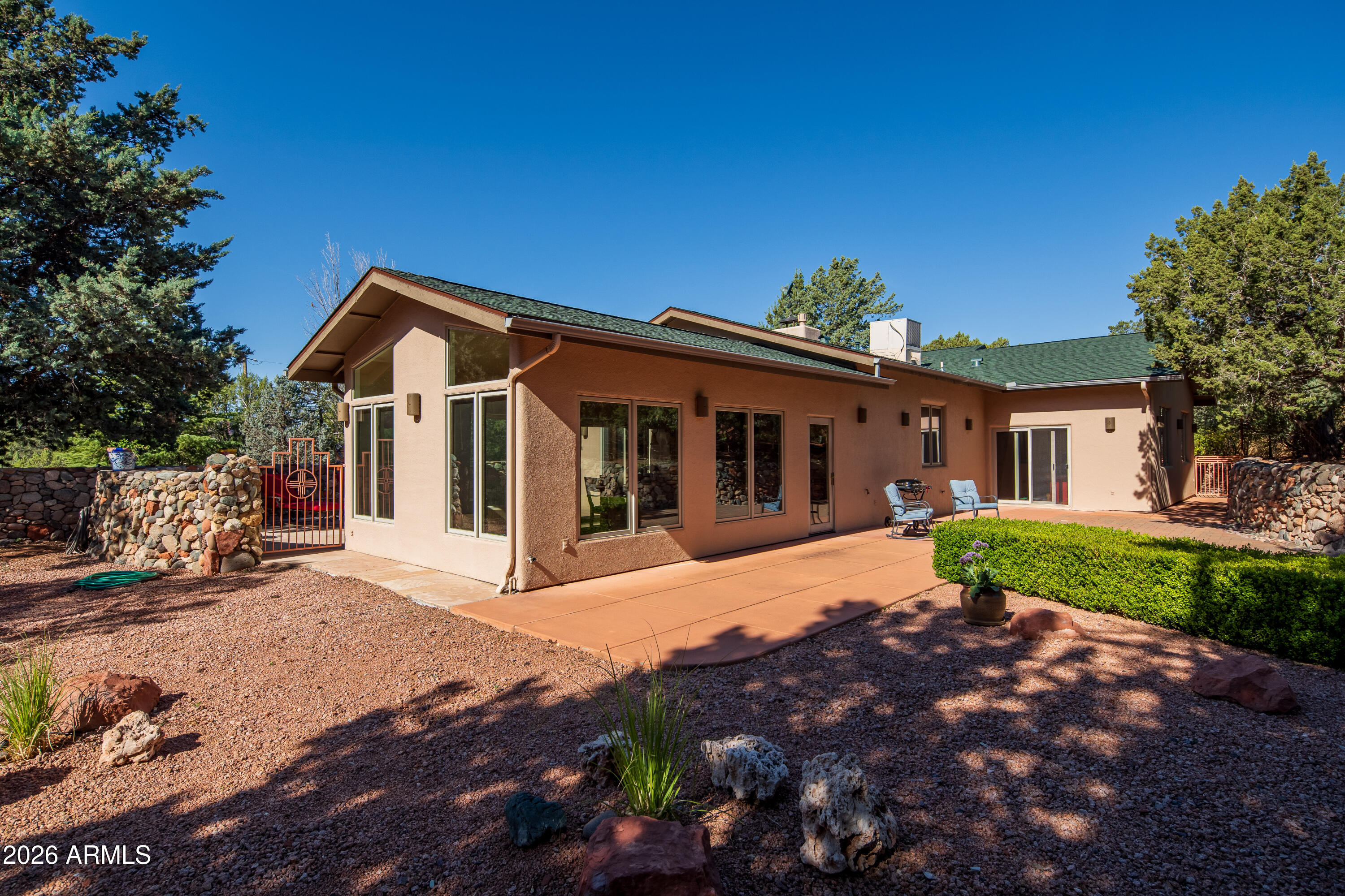 190 Morgan Road Sedona, AZ 86336 - Photo 17 of 51 a view of a house with a patio