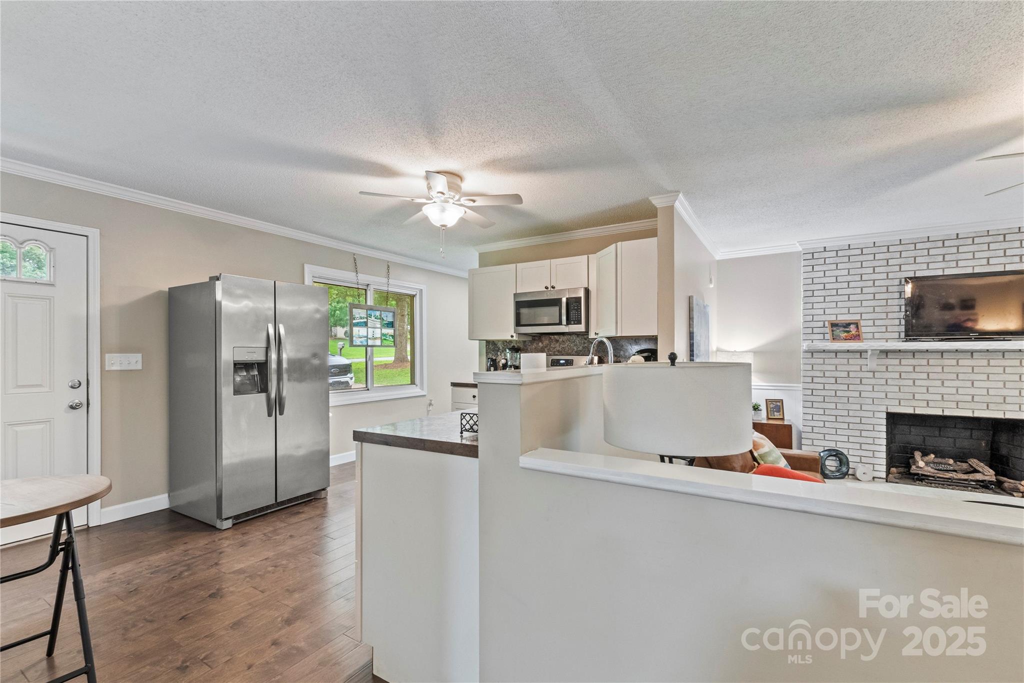 4515 Diamond Street Hudson, NC 28638 - Photo 14 of 26 a view of living room with furniture and a fireplace