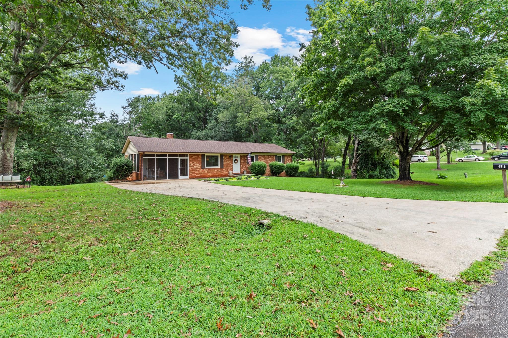 4515 Diamond Street Hudson, NC 28638 - Photo 5 of 26 a front view of house with yard and green space