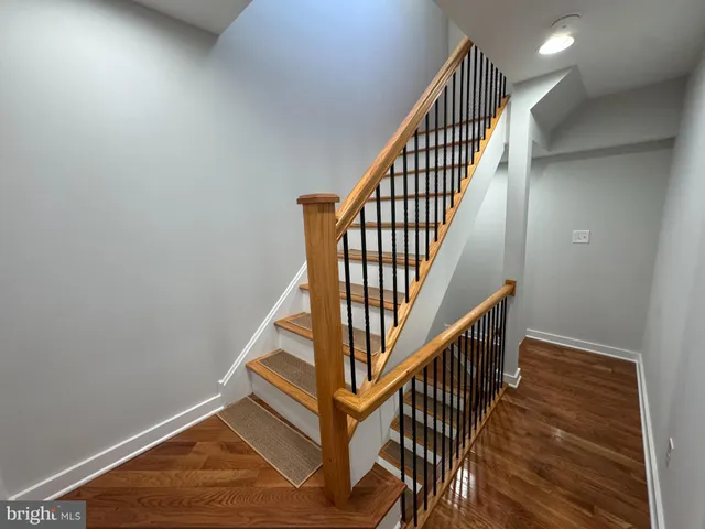 a view of entryway with wooden floor