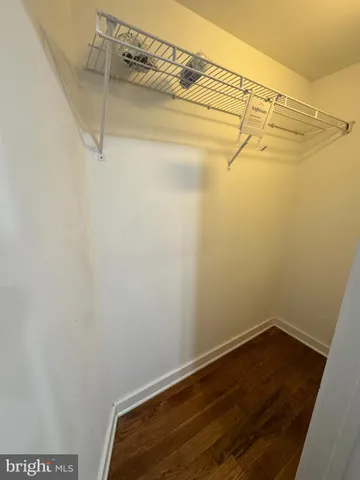 a view of a room with racks on the wall