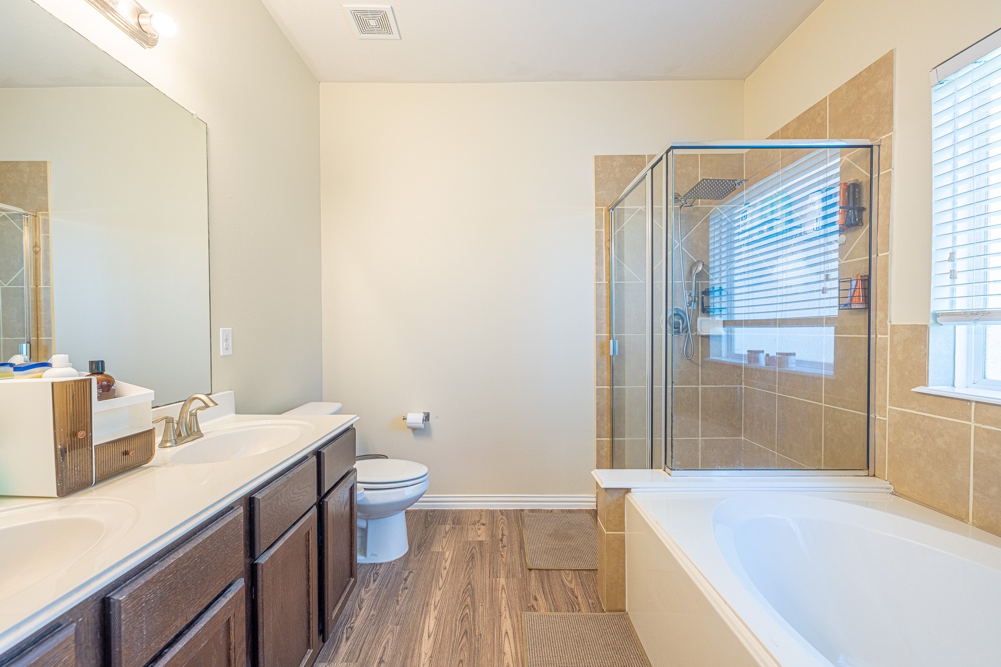 3818 Hunters Trail Baytown, TX 77521 - Photo 18 of 32 a bathroom with a sink a toilet and shower