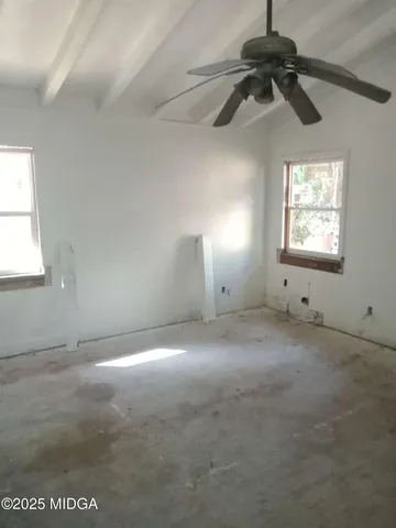 a view of an empty room and window