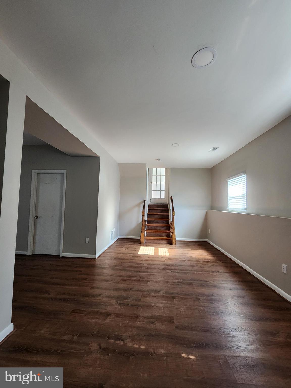 6660 Hunter Road Elkridge, MD 21075 - Photo 19 of 27 a view of a livingroom with wooden floor