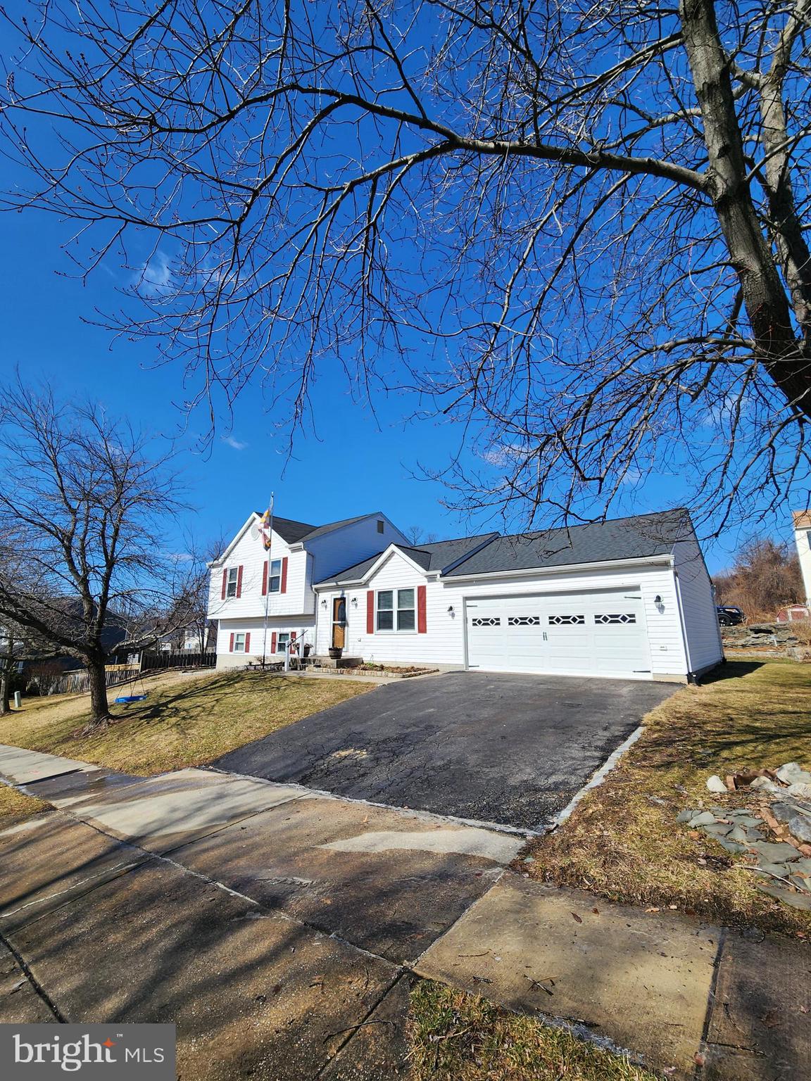 6660 Hunter Road Elkridge, MD 21075 - Photo 2 of 27 a view of a house with a yard