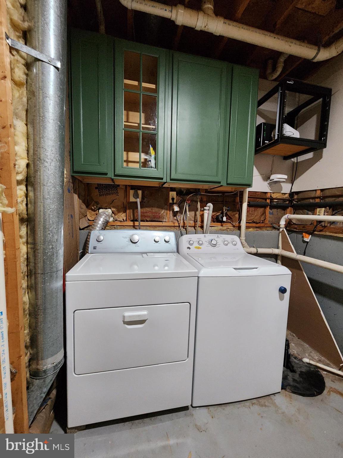 6660 Hunter Road Elkridge, MD 21075 - Photo 21 of 27 a utility room with dryer and washer