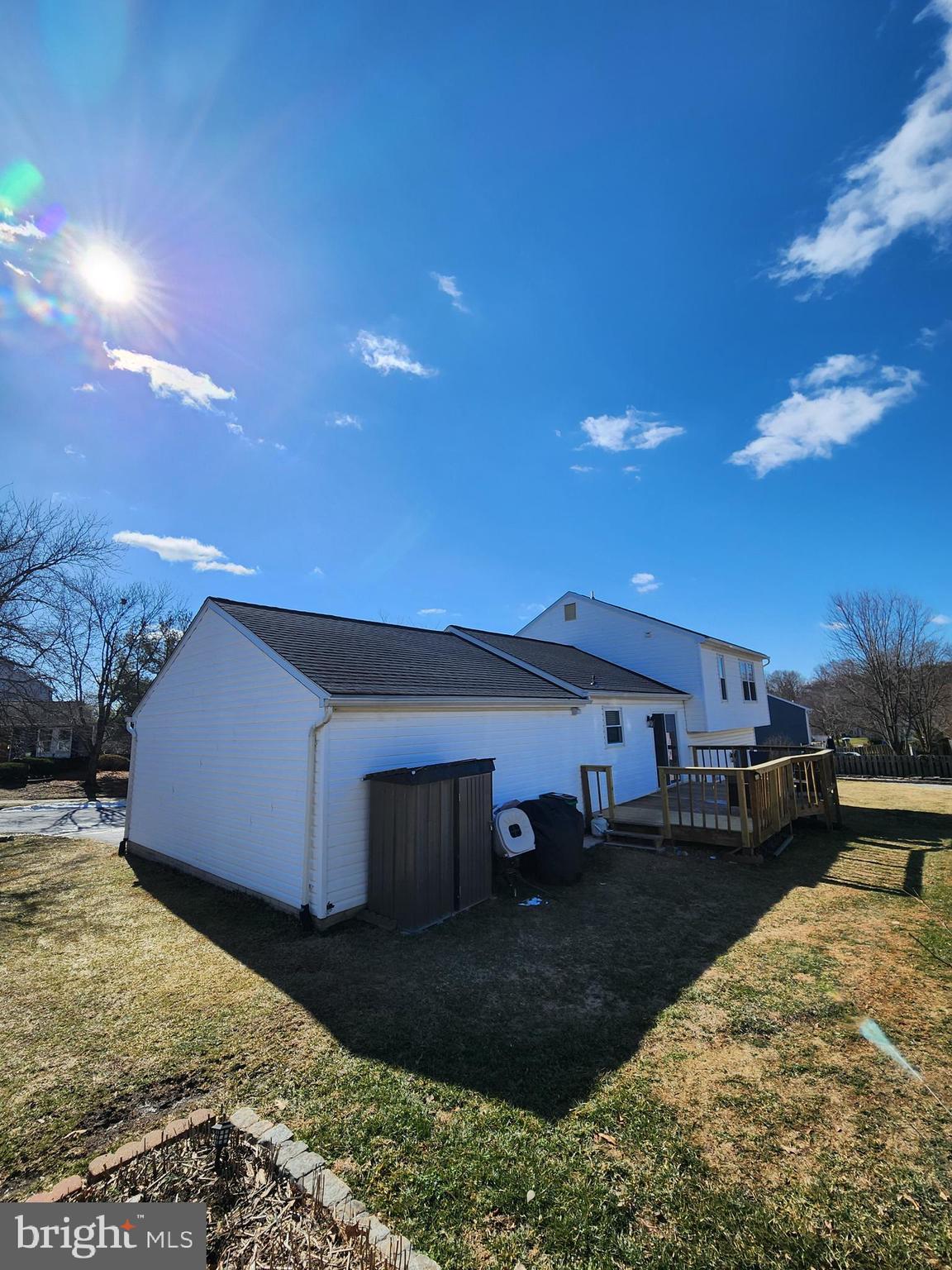 6660 Hunter Road Elkridge, MD 21075 - Photo 23 of 27 a view of a house with a yard