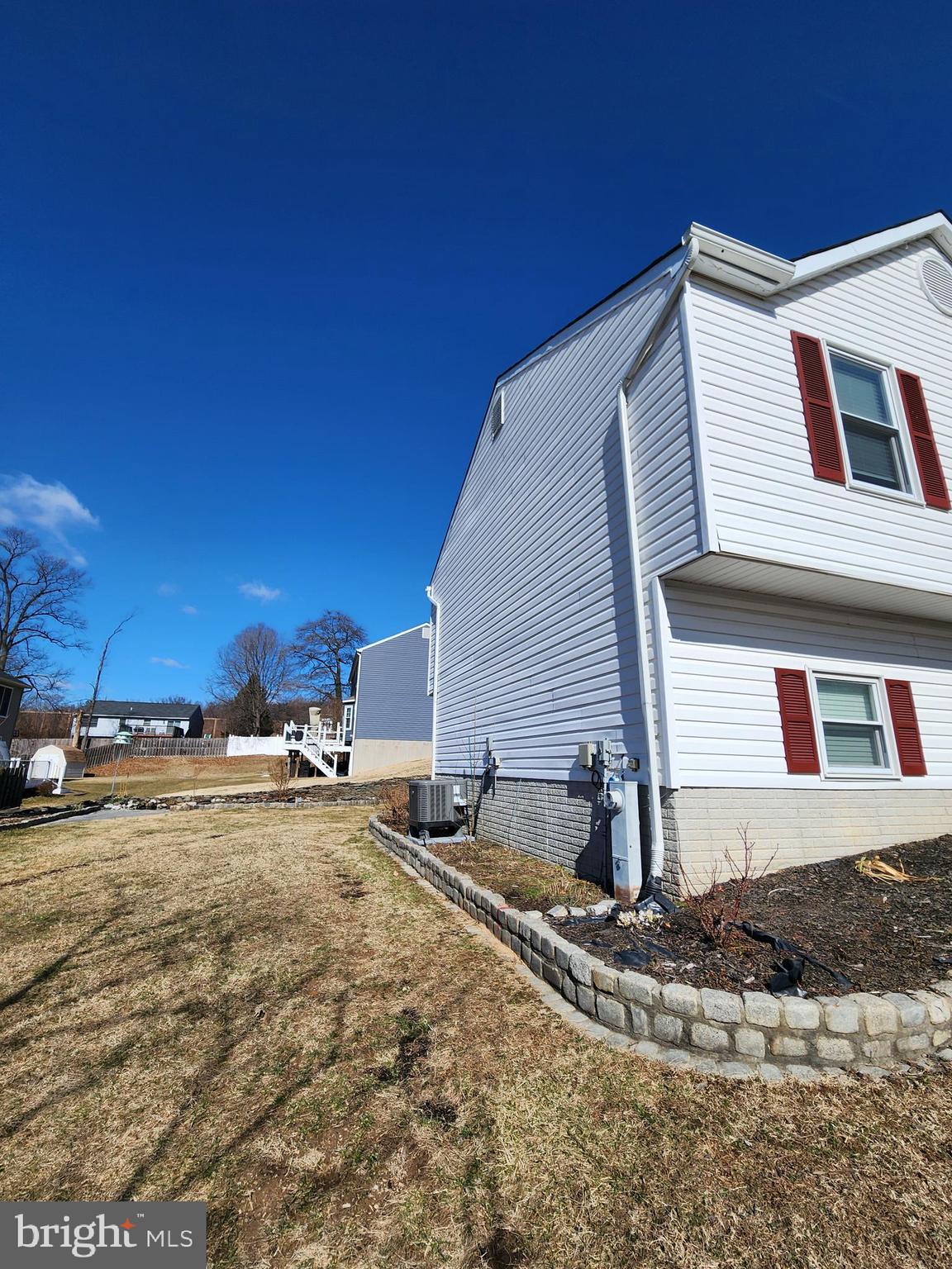 6660 Hunter Road Elkridge, MD 21075 - Photo 26 of 27 a view of a house with snow on the road