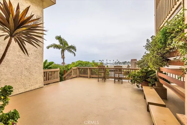 a view of a terrace with chairs